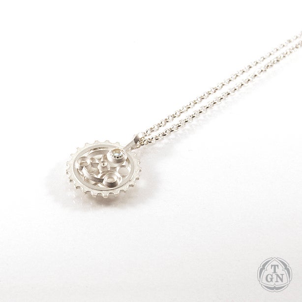 Juhani Ananin: Parts of The Machine Singu (pendant with topaz)